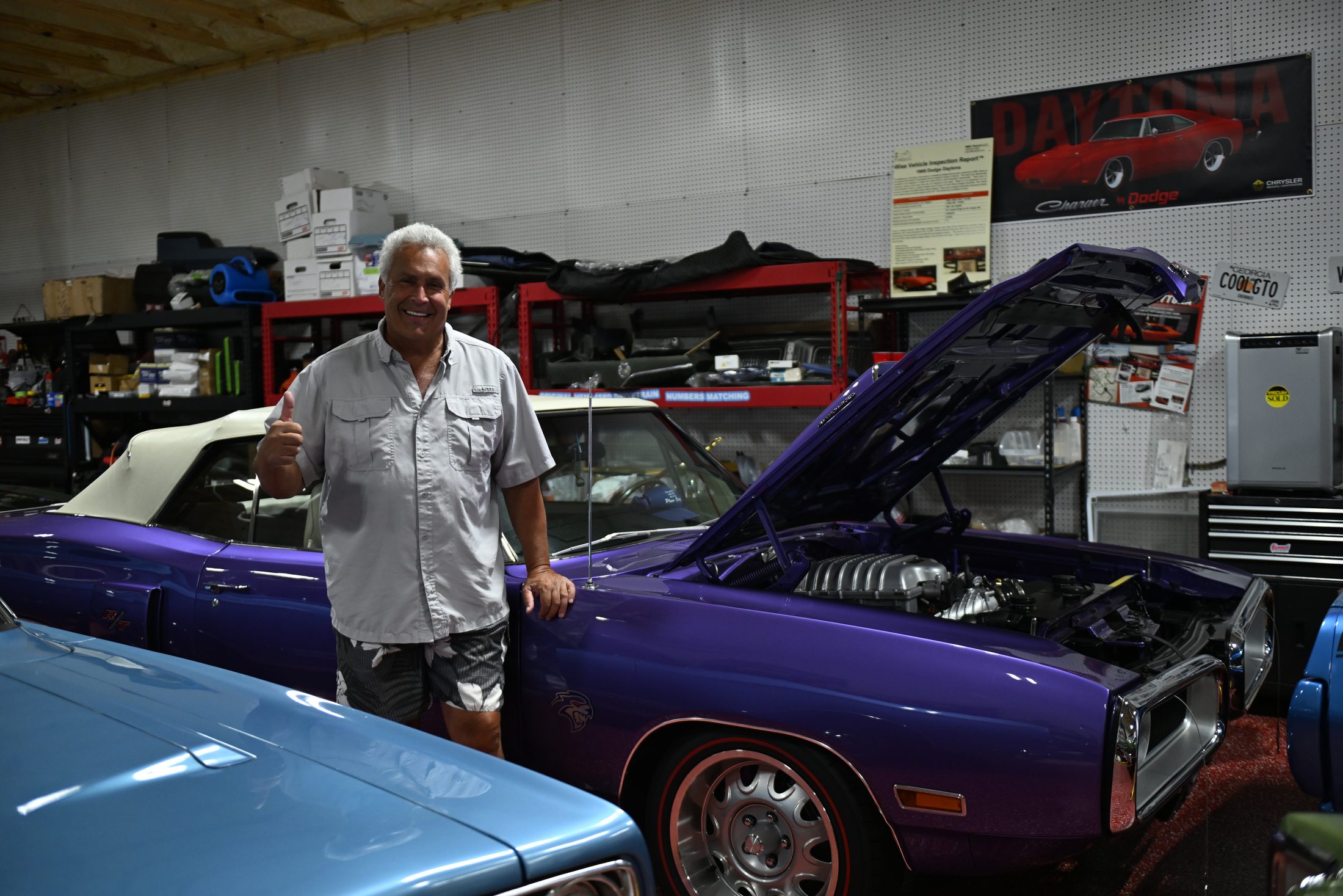 Blalock Customs owner with a supercharged Dodge Charger R/T in the shop